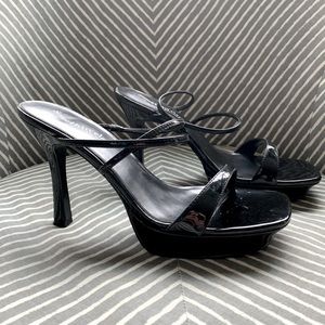 Somethin’ else from Sketchers black synthetic patent 4” high heels. US size 8.